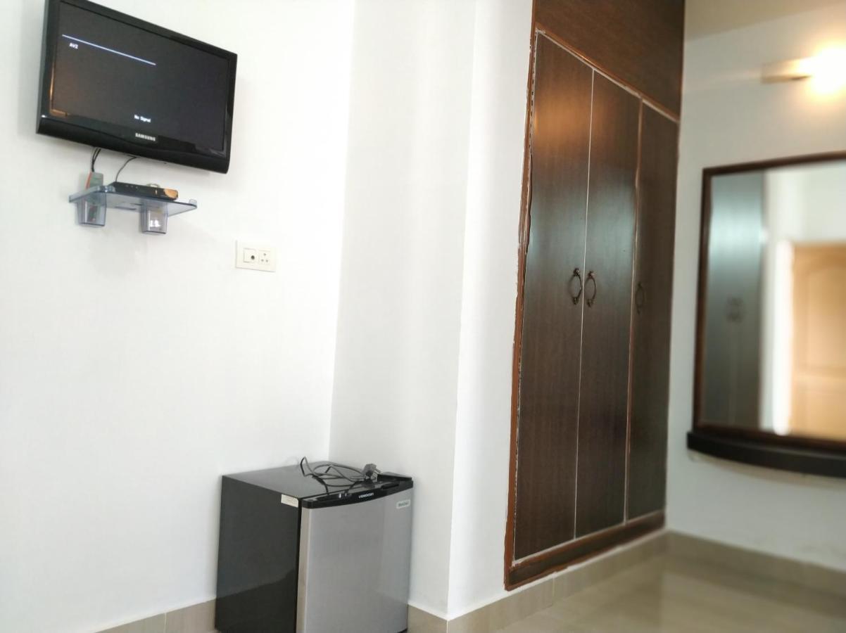 Aum Hotel Puttaparthi Extérieur photo